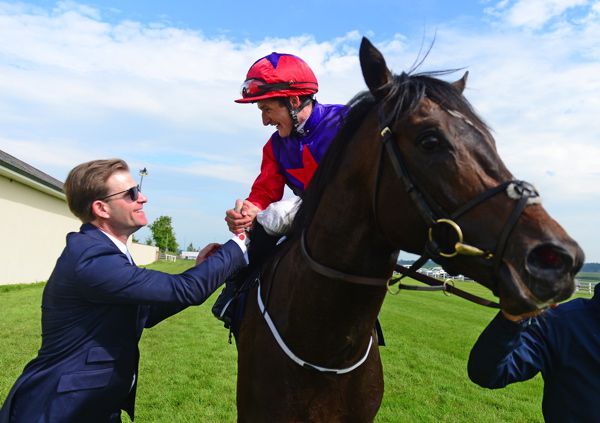 Shane Foley and trainer Ken Condon after Romanised's Guineas victory