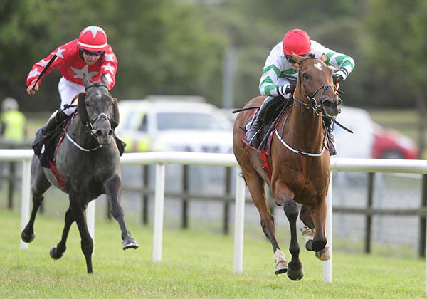 Batts Rock (red cap) is ridden out by Lisa O'Neill to beat Percy
