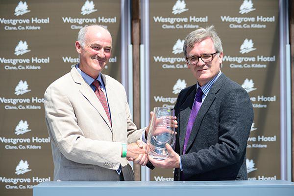 Dick Brabazon (left) receiving his award from John Fitzgerald
