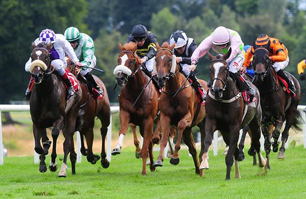 Law Girl (far right) sweeps through to lead under Colin Keane