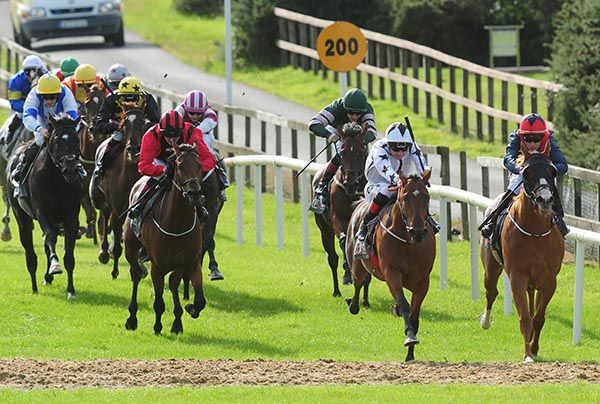 Declan McDonogh (white and black colours) sends on Power Down for the win