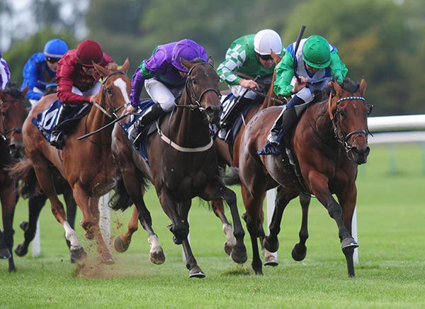 One Master (green cap) leads home her rivals under Colm O'Donoghue