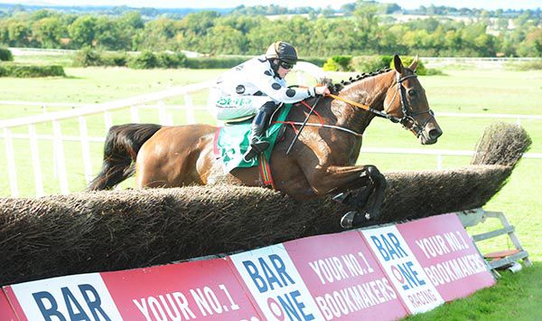 Abbey Magic jumps the last under Rachael Blackmore