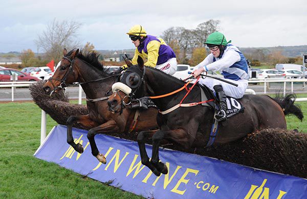 He Knows My Name (far side) and Carlitos Bay jump the last together 