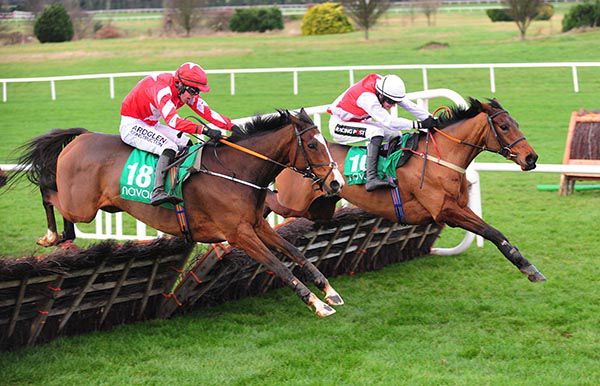 Salty Boy (far side) and Golden Jewel jump the last 