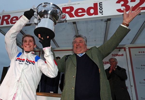 Harry Cobden and Paul Nicholls celebrate their 32Red King George victory