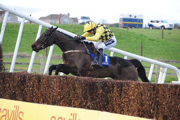 Al Boum Photo and Ruby Walsh pictured on their way to victory