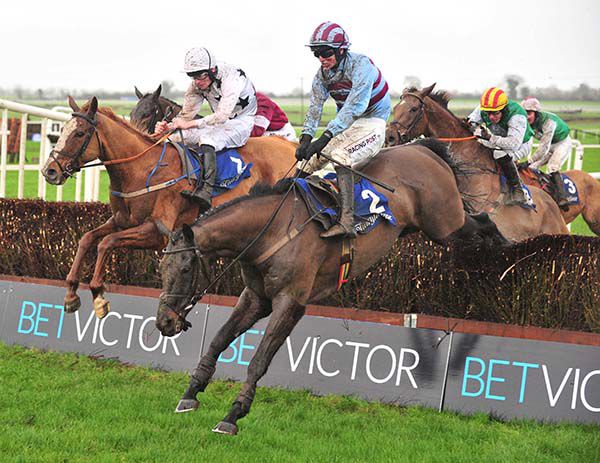 Dylrow (Danny Mullins) jumps to the front at the last