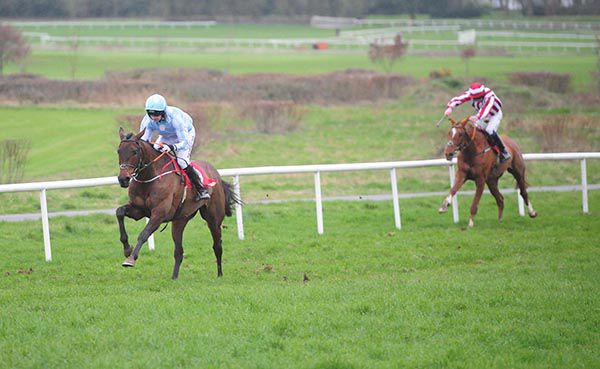 Minella Melody (Patrick Mullins) strides on from stable companion Full Time Score (David Roche)