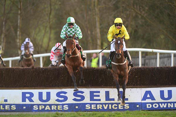 Billaway and Patrick Mullins (right) clear the last fence with Tareeshar 