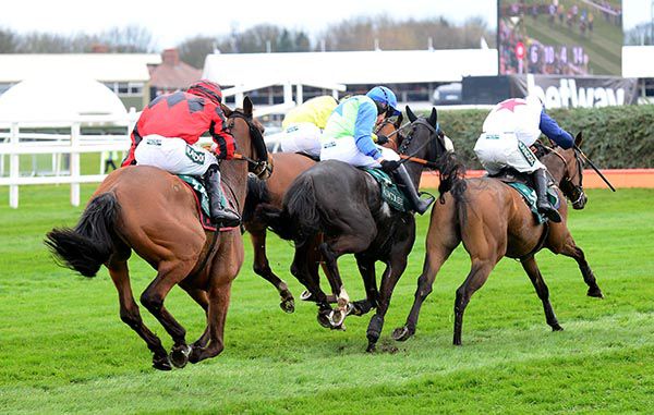Red and black colours Three Musketeers comes with his winning run under Jack Kennedy
