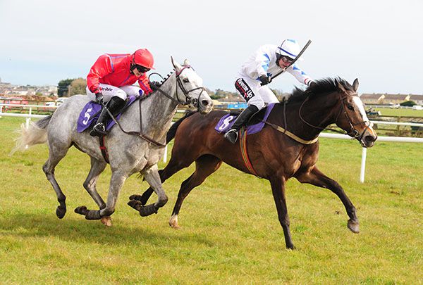 Sullane Hill is ridden out by JJ Slevin to beat the grey Eclair De Rock