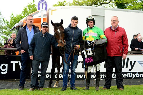 Derek Fox, trainer Mark McNiff (2nd from left) and owner Liam Kelly (left) pictured with Pump Road
