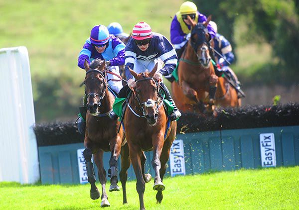 Peaches And Cream races away from the last under Jonathan Moore