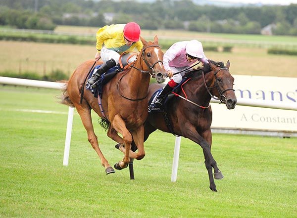 Drumquina and Andrew Slattery (pink colours) just getting the better of Castletownshend
