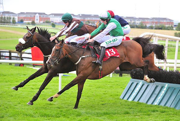 DIAMOND HILL (near side) and Paul Townend join issue at the last before winning at Galway.