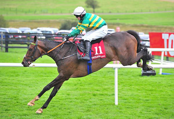 ILIKEDWAYURTHINKIN (Darragh O'Keeffe)  clears the last en route to victory at Galway.
