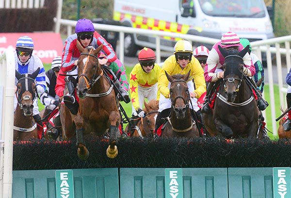 BERCASA (purple cap) took the Mares' Handicap Hurdle under David Mullins