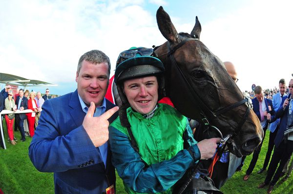 Gordon Elliott and Luke Dempsey celebrate the Galway Plate win of Borice