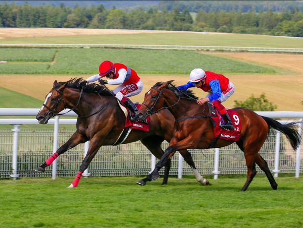 Deirdre (left) winning the Nassau Stakes at Goodwood