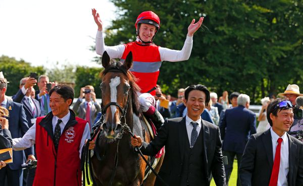 Deirdre and Oisin Murphy after winning the Nassau Stakes at Goodwood