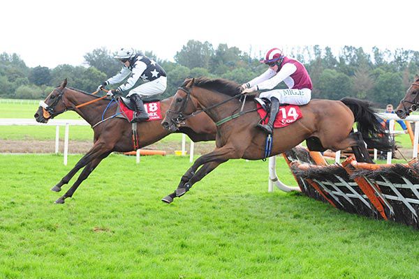 NIBBLERS CHARM and Donie McInerny (right) winning at Cork.