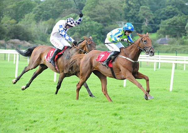 DRURY and Patrick Mullins (right) win the bumper at Cork.