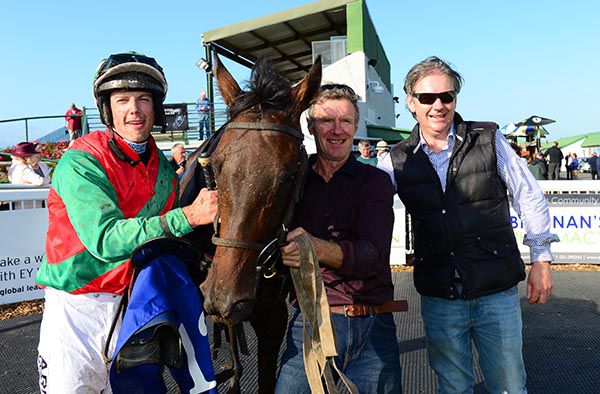 Sweet Sting with Brian Hayes (jockey), trainer Michael Bowe (centre) and John Bowe