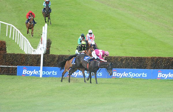 DOLLY DANCER and Brian Hayes make a bad mistake at the second last before winning. 