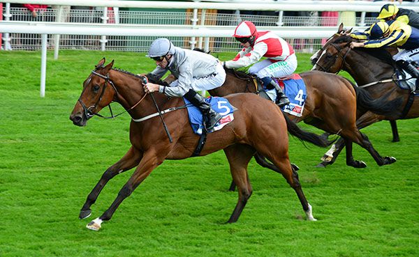 Living In The Past (left) and Danny Tudhope win the Lowther Stakes