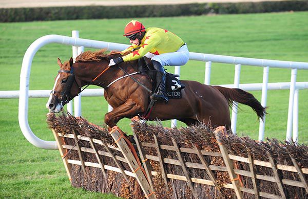 Touch Of Gold and Paddy Kennedy clear the last