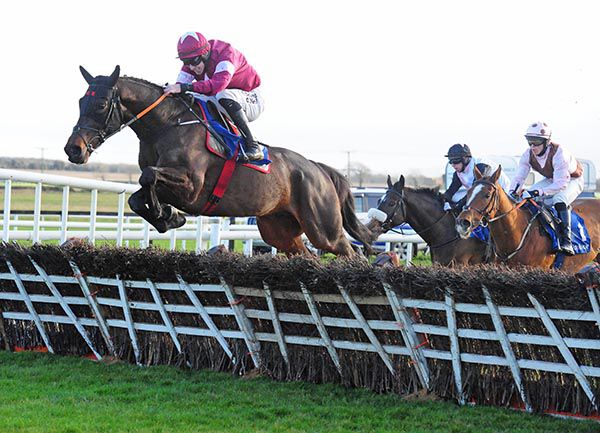 Conflated clears the last in front in the maiden hurdle