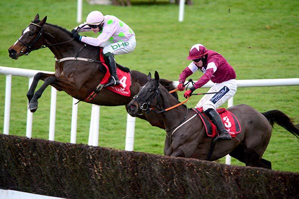 Min (left) flies the last in the 2019 renewal of the John Durkan Memorial Chase