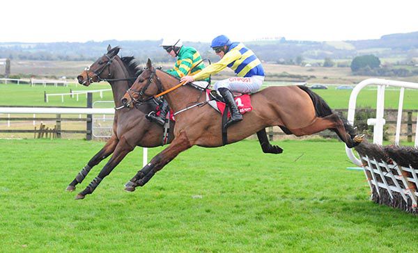 Gealach (Davy Russell, nearside) comes to beat Pasley (Mark Walsh)