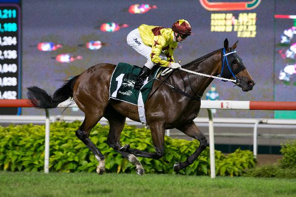 Zac Purton guides Southern Legend to Kranji Mile success.