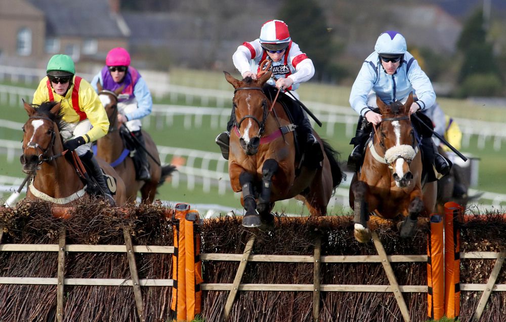 Brian Hughes (right) winning on Lily's Gem at Carlisle in February for Stuart Crawford