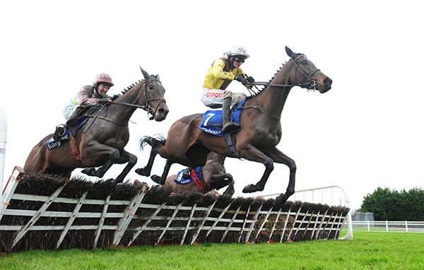 Burning Victory (Danny Mullins) leads from Hook Up (Rachael Blackmore, nearside)