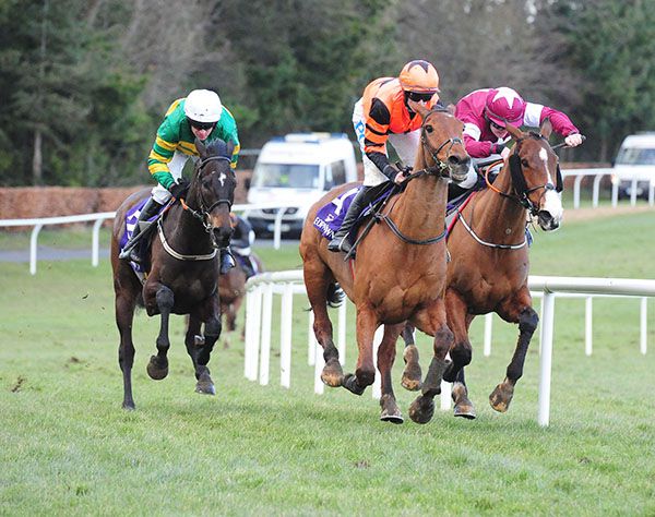 Charli Parcs (green and gold) tracks his rivals turning in