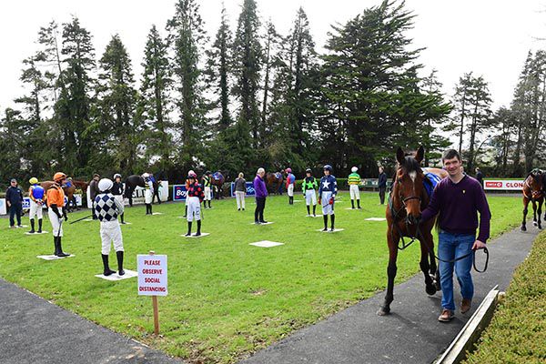 jockeys and trainers social distancing in the parade ring at Clonmel