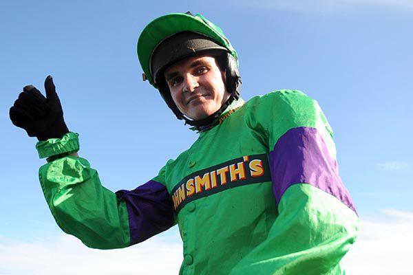 The late Liam Treadwell after winning the Grand National on Mon Mome