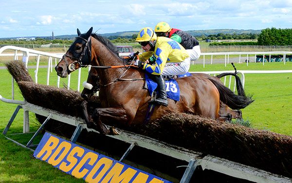 Warreedy and Denis O Regan (near side) head Rudy Catrail at the last 
