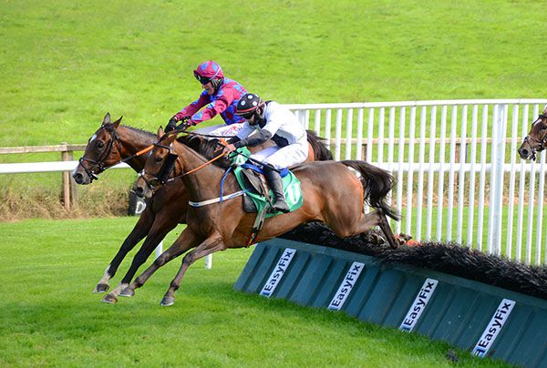 It Takes Time (Conor Orr, nearside) comes to tackle and beat Golden Nomad (Robbie Power)