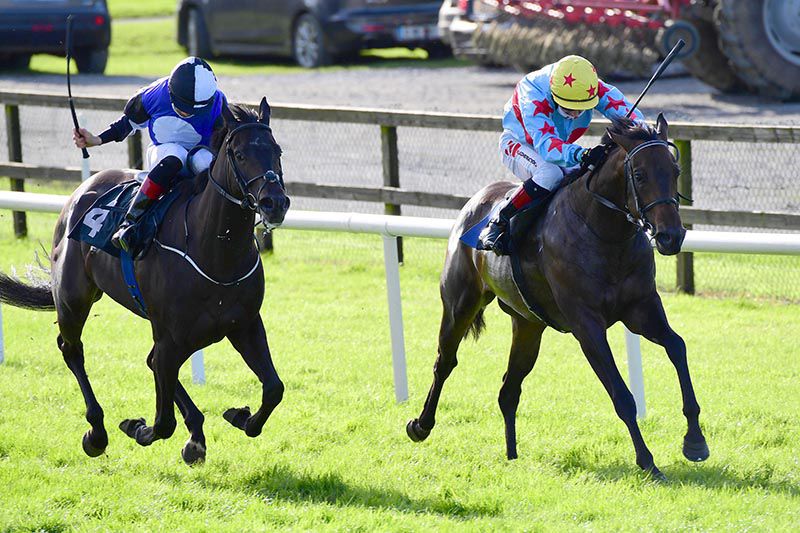 A Step Too Far (right) is ridden out by Colin Keane to beat That's Mad 
