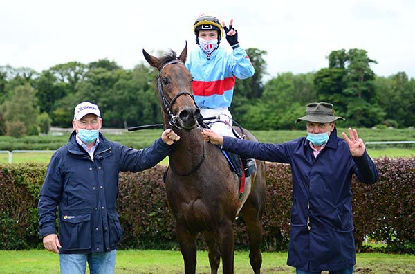 A Step Too Far And Colin Keane with Danny Murphy (left) and trainer Kieran Cotter (right)