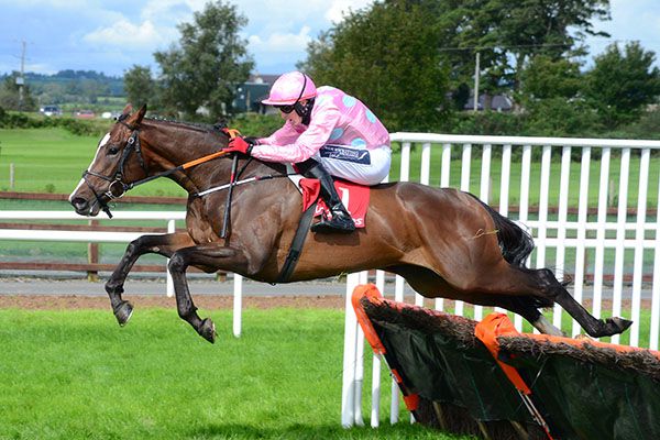      Longclaw and Keith Donoghue jump the last