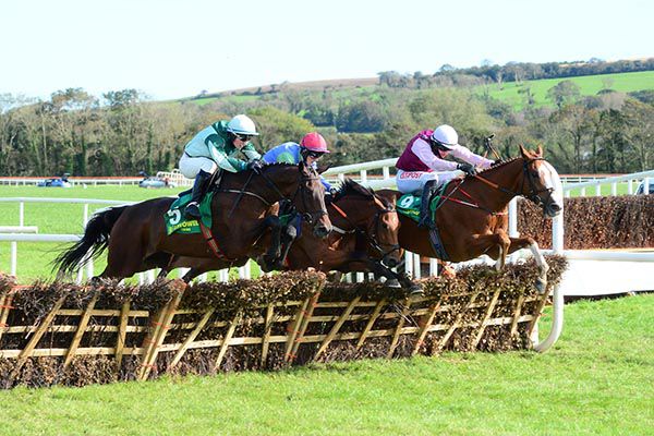 Drumacoo and Mark McDonagh (near side) jump the last to win from Grange Walk (far side) and Born By the Sea