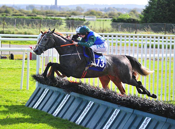 Kapard and Rachael Blackmore (near side) head Aubretia at the last