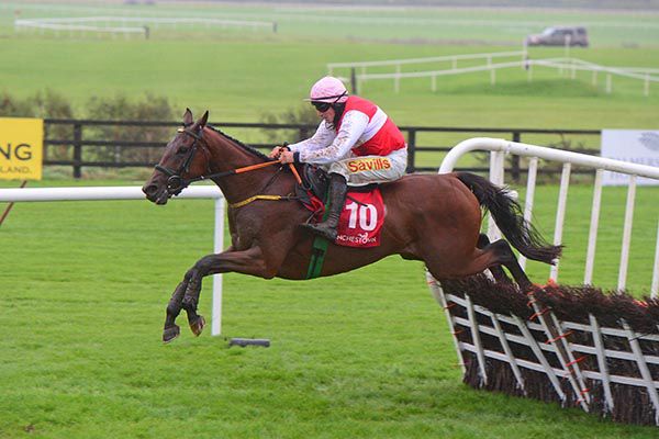 Young Ted and Sean Flanagan sail over the last