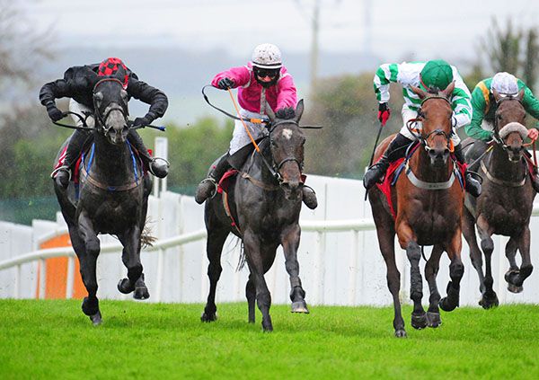 Scheu Time and Gavin Brouder (pink)  win from Bridge Native (green cap) and Dollar Value (left)