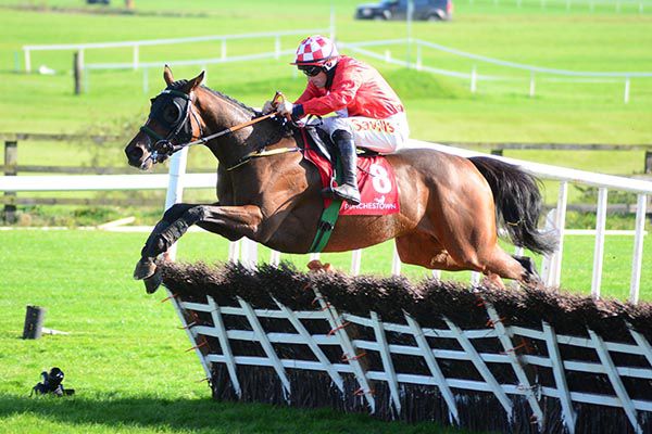 Red Gerry and Sean Flanagan jump the last 